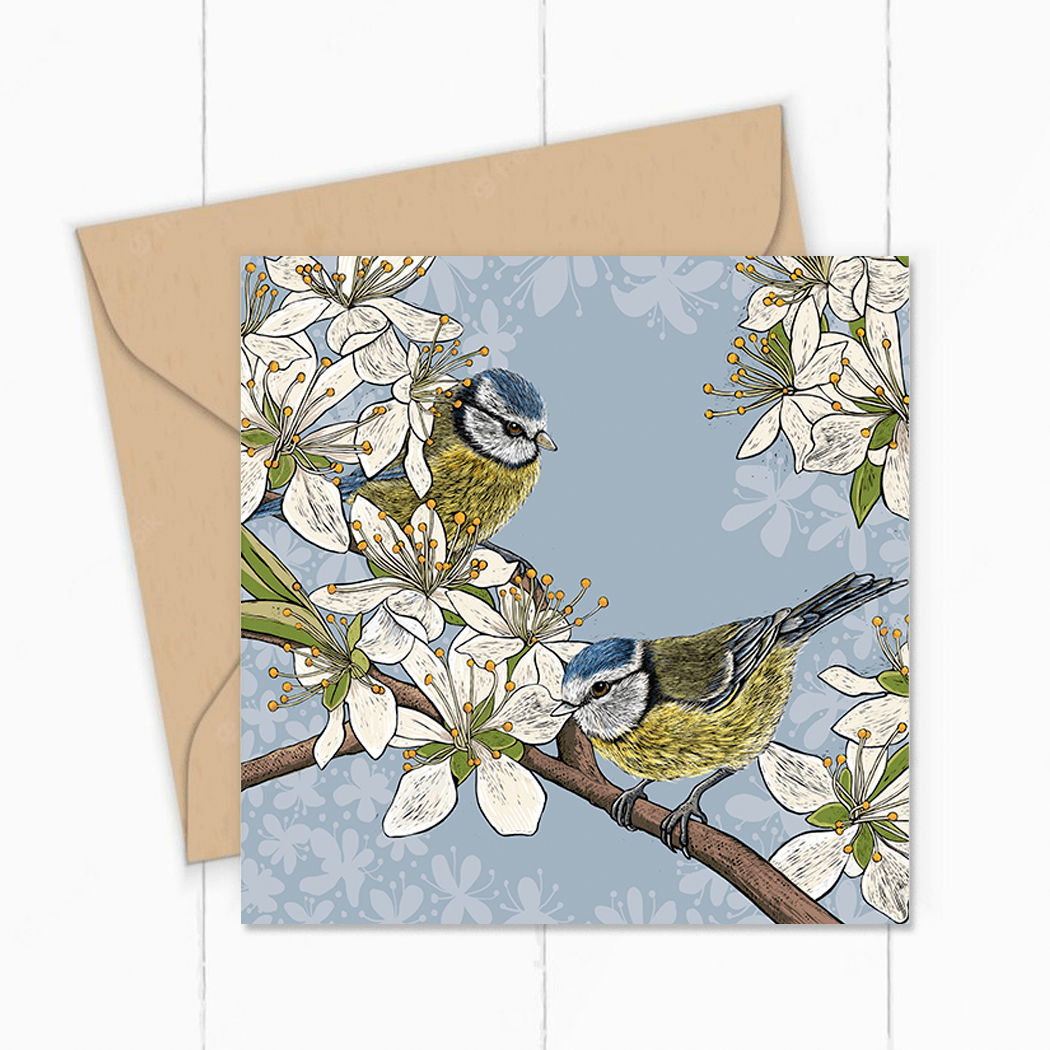 Greeting Card by Fox and Boo featuring Blue Tits in a hawthorn blossom with a blue grey background
